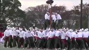 Recently published by the Naval Institute Press, "The Herndon Climb" (https://tinyurl.com/y2tayu4s) details the history of the United States Naval Academy tradition of Midshipman working as a team to climb a greased 21-foot tall monument to mark the end of their plebe year. It would be interesting if USNA made the climb even more challenging by combining it with Bo-taoshi, a game traditonally played by Japanese cadets at the National Defense Academy. | U.S. Naval Institute