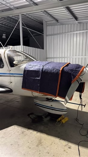 Snug as a bug in a rug. She likes her new heater and blankies! | Angry Octopus Aviation