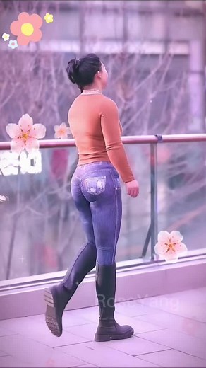 Stylish Outfit Inspiration: Orange Top and Floral Jeans