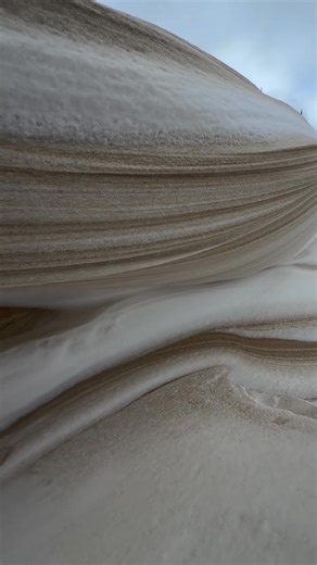 Check This Out! The wind combined with the sand and the snow to sculp this incredible piece of natural art! It looks like marble to me. This was taken today in Port Elgin, which is on Lake Huron's eastern shore north of Kincardine, Ontario. Amazing! To say this weekend's weather is going to be brutal is a bit of an understatement. Many roads remain closed and plows are being pulled in some areas because the snow is drifting too quickly making visibility nil at times. So please stay home if at al