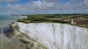 The drone aerial footage of Belle Tout Lighthouse at Beachy Head, East Sussex, UK. The Belle Tout Lighthouse is a decommissioned lighthouse and British landmark located at Beachy Head, East Sussex.