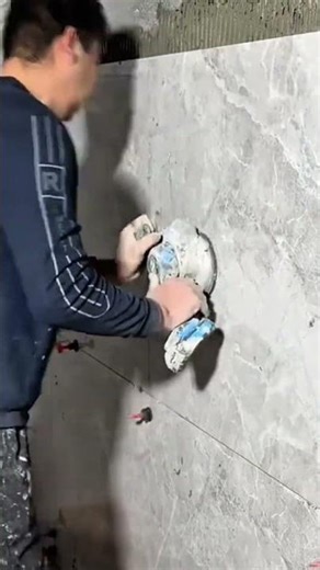 Use ceramic tile adhesive with a trowel because of the density of the wall structure #construction