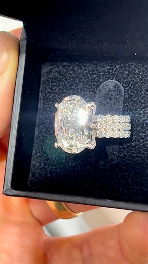 Alan Wood | Engagement Ring Designer ✨ on Instagram: "Get out your sunglasses for this one 😎 An oval diamond surrounded by layers of light, set in a brilliant band designed to move with it, not compete. If you want to get the most out of your diamond, invest in craftsmanship first. The sparkle in these diamonds are the result of how well it handles light, not it's carat weight. A properly cut stone set with precision will look brighter, sharper, and more alive than a heavier stone in an unsuita