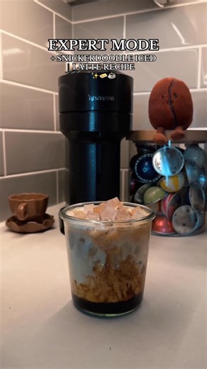 Eesha 🍝🍫🍩 on Instagram: "Snickerdoodle Iced Latte + Nespresso Expert Mode 🧈☕️✨ ✨ sugar cookie syrup + @cinnamontoastcrunch cinnadust ✨ 2 shots espresso ✨ ice ✨ milk of choice ✨ extra cinnadust on top Expert Mode: * if you have a @nespressousa vertuo next, vertuo pop +, or the creatista you can turn your coffee pods into 2 shots of espresso using expert mode! ✨ double tap the power button and the light will turn teal - this means the feature is activated! #coffee#coffeerecipes#coffeetime#coff
