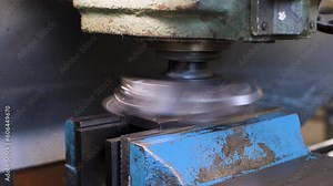 Turning and milling machine in a modern factory, CNC automated system rotates and works in real time. industrial video