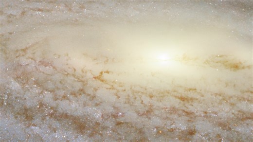 Pan of Spiral Galaxy NGC 3254: A Galactic Powerhouse | Hubble FriendsofNASA.org: This image shows the spiral galaxy NGC 3254, observed using Hubble's Wide Field Camera 3 (WFC3). WFC3 has the capacity to observe ultraviolet, visible and near-infrared light, and this image is a composite of observations taken in the visible and infrared. In this image, NGC 3254 looks like a typical spiral galaxy, viewed side-on. However, NGC 3254 has a fascinating secret that it is hiding in plain sight—it is a Se