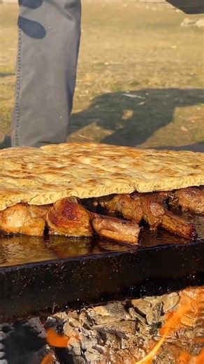 21K views · 677 reactions | Sizzling meat cooked on an open griddle over fire, infused with aromatic seasonings. A delicious outdoor feast awaits. #GriddleCooking #OutdoorDining #TraditionalCuisine #Cooking | Easy life | Facebook