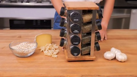 Kamenstein 12 Jar Madison Revolving Countertop Spice Rack with Spices Included, FREE Spice Refills for 5 years, Black Rack with Black Caps