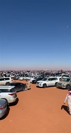 Gathering in the Desert: Traditional Attire and Excitement