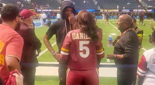 Jayden Daniels’ Mom Was Causing a Major Distraction On The Sideline With Her Custom Leather Outfit That Showed Plenty Of Leg [VIDEOS]