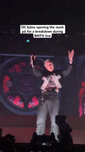 Oli Sykes uses his hands to open the mosh pit during Bring Me The Horizon Live… #bmth #metalcore