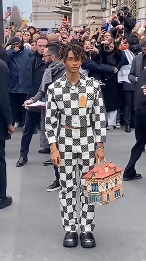 What could this cost? Bag Description: The bag is a miniature replica of the Arc de Triomphe. Cost: It was reported to cost approximately $48,000 or $48,500. Context: Smith was seen with the bag in Paris while with his then-girlfriend Sab Zaba. | My Publicist