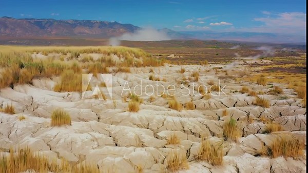 Mud Pots and Cracked Earth in a Dry Mountainous Geothermal Area with Steam Vents