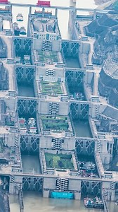 Ships ride one of the world's largest two-way ship elevators, the 113-meter-tall five-lock lift at the Three Gorges Dam, the world's largest hydropower project, in Yichang, Central China's #Hubei Province. #ChinaInfrastructure | Xi's Moments