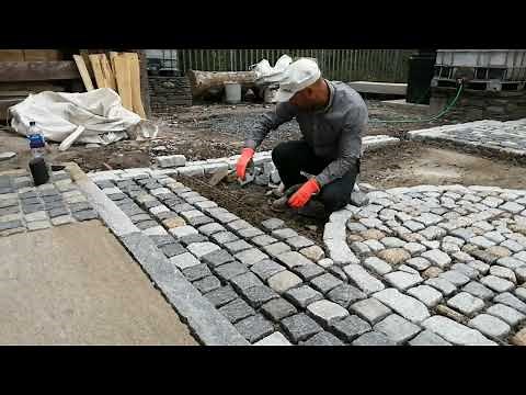 Laying Granite Setts at our yard