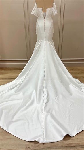 Finally, the reveal! This gown may always stand out as one of the most challenging stains my dry cleaner partner and I have ever tackled. Not because it was a ballgown bustle stain, but because what was embedded in the fibers was layer upon layer of dirt, oil, tar, grease, and city grime from a night spent dancing through the streets of Chicago and having the time of their lives. Each type of residue had to be lifted differently, carefully, and intentionally, all while preserving the integrity, 