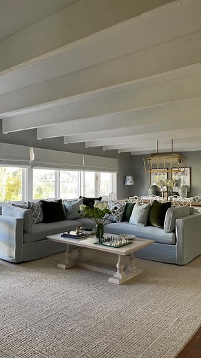 Imen kannouj on Instagram: "Styling my new modular slipcover sofa from @oneworldcollection ✨ I’m completely in love with it! 💙 The pale blue with white piping instantly lifts the room, creating that light, airy feel I’ve always wanted. It’s the perfect Hamptons-inspired sofa — though it honestly works beautifully in any style of home 🤍. Super comfy, and the slipcover design means I can easily wash it if the kids make a mess 🙌. I’ve styled it with floral cushions and deep green velvet ones for