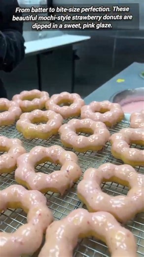 Behind the scenes: Hot oil transforms donut batter to gold rings.