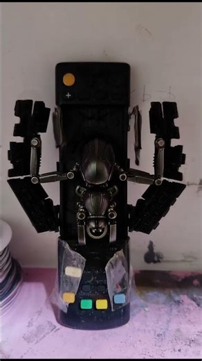 TV remote control turns into a spider robot