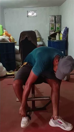 with the help of a rubber band leg exercise