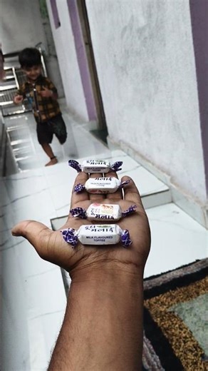 Cute baby gems chocolate 🎉🤩🥳😻🍇🍭🍡🎈🍇#anaya #funny😂😛#viral #trending #cutebaby #gems #dairymilk
