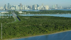 Aerial sunrise view of Key Biscayne resort Island Cape Florida State Park beach Miami Skyline Skyscrapers Biscayne Bay USA