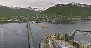 Tromsø Norway Aerial v13 low level drone flyover cantilever bridge leading to the landmark building arctic cathedral at tromsdalen valley in town center - Shot with Mavic 3 Cine - June 2022