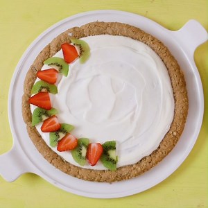 74K views · 34 reactions | Is it fruity? Is it cookie? Is it pizza...y? What if we told you it’s all three! 諾 If you want the full recipe for this BBC Good Food fruity pizza cookie, head over to our website. The topping for this recipe uses: 200g Onken Natural Set 100g Cream cheese 25g Icing sugar 200g Strawberries 2 Kiwi Fruit 75g Blueberries #FeedYourInnerHappiness | Onken Yogurt | Facebook