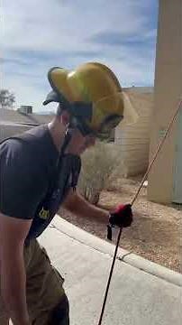 Hoisting a flat head axe and charged hose line