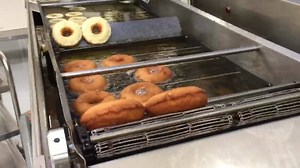 One week until opening day! Time for a test run on the donut machine. You'll have to trust us, but they were delicious! | Brant's Apple Orchard