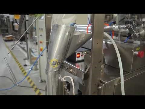 Small-scale liquid milk filling and packaging machine for dairy products, using square corner