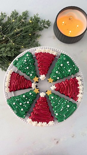 These Frosted Christmas Brownies are one of the easiest Christmas dessert recipes, right behind the viral Cheesecake Santa Hats I shared last month. I'm not the best at decorating cakes, cookies, or brownies, but this was so easy and it is so festive! We typically host Christmas dinner for our family with 30 people and have many family Christmas gatherings throughout the holiday season. And while I love creating lots of homemade dishes for our Christmas parties, I always like to throw in some re