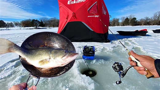 Bass catch and cook on pond during icy conditions