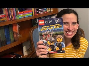 Mrs. Miller reads a Lego City Book “Detective Chase McCain: Stop that Heist”