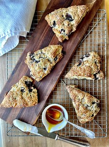 26K views · 214 reactions | These scones are a delight from morning to night! Chef Curtis Stone shares how to dress them up for dessert or save and bake for an easy breakfast treat. Get his full recipe for Blueberry Ginger Chia Seed Scones with the link below. | Bosch Home | Facebook