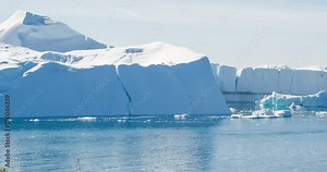Greenland Iceberg landscape of Ilulissat icefjord with giant icebergs. Icebergs from melting glacier. Arctic nature. Stock Video