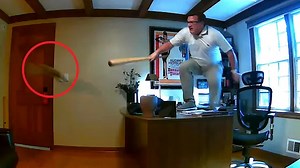 Man freaks out after squirrel enters his office