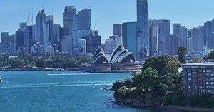 Aerial video of Sydney City and Sydney Harbor at sunset, Australia