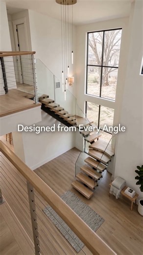 Inside a Modern Floating Stair Project with Glass Railing