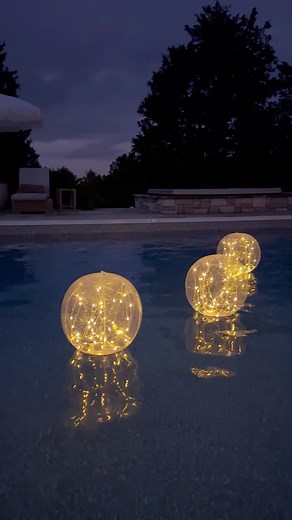 Amazon outdoor find! Solar powered pool lights! These charge all day in the sun and then light up at night! They add such a cozy glow and they are perfect for night time swimming! I love the way they sparkle in the pool! #outdoorliving #backyardvibes #summerparty #outdoorentertaining #summervibes #amazonoutdooor #summerfinds #outdoorliving #amazonmusthaves #poolparty #poolideas