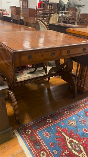Mullens Laurel Park on Instagram: "Lot 220 A REGENCY MAHOGANY AND ROSEWOOD CROSSBANDED SOFA TABLE the rectangular hinged top with two frieze drawers and opposing mock drawers on lyre end standard supports and platform base with reeded splayed legs with brass caps and castors joined by a spiral twist stretcher 76cm (h) x 148cm (w) x 79cm (d) EST €250 - €350"