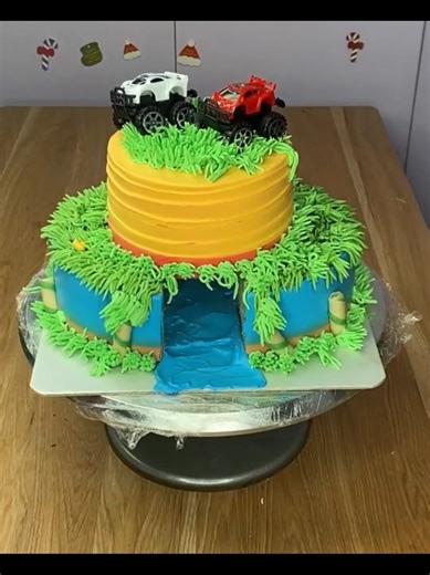 Landscape Cake Design with Toy Trucks