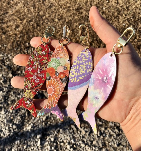 Anja Yasutake | First keychains are completed 🥰🥰😍. 🐟🐠15$ each. Wooden base topped with Japanese Origami paper and coated twice to keep the color and very... | Instagram