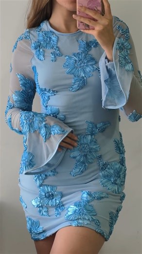 Sisterparty | Blue blooms in motion 💙🌸 This sheer-sleeved mini dress is all about romance with a twist—flared cuffs, bold florals, and a silhouette that... | Instagram