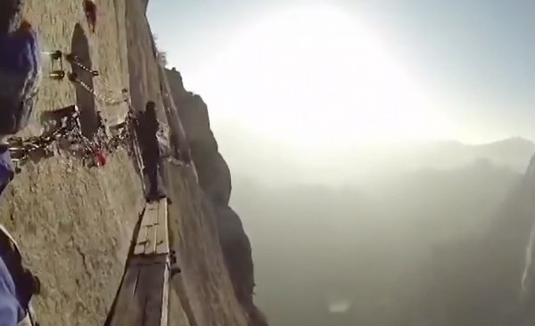 Cliffside Hike On Narrow Planks Tests Hiker’s Courage And Balance