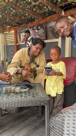 Itskokopee Ogaga okokowa on Instagram: "Today in Warri I met @deejayoghenewoke She’s a bundle of talent , funny and very smart! She was loved by everyone around me , she made us all laugh ! My guys offered to support her! @iam_mrgerman offered to pay her school fees from primary 1 to 3, he’s the one wearing man united jersey ! @riosoft is my chair wearing white that came last , he gave her N500,000 God bless her father for all his efforts"