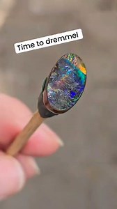 Time to dremel this amazing boulder opal split and reveal its stunning colors and shine! 🌈💎 Let's uncover the hidden beauty within. https://www.opalauctions.com/auctions/boulder-opal?sortby=oa.auctions #Opal #OpalAuctions #BoulderOpal #GemstoneMagic | Opal Auctions
