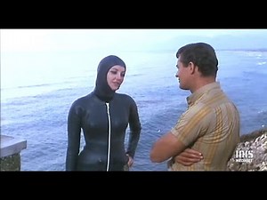 Another Frogwoman in a gorgeous rubber wetsuit!