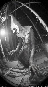 CCTV footage from an abandoned circus shows a harlequin with demonic features—pale, cracked skin, glowing eyes, and long, hooked claws—standing alone in the center ring. He didn’t move… until he slowly turned and stared directly into the camera with a smile that split his face ear to ear. The feed cut seconds later. But here’s the chilling part: the camera hadn’t been powered in years. So… who turned it on? And who was really watching whom? Drop your theories below. 🎭 #Paranormal #Inexplicable 