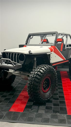 @redlinedesigns25 on Instagram: "#054 is ready to roll! Huge thanks to @gabeyeahbuddy for giving me full creative control over the design on this body for his custom VRD build! 🙏🏼 We took a stock RTR and built it out into a one of a kind rig for him! Here’s what we used… # 054 build list - RTR @vanquishproducts Stance - Aluminum F10 axles - Stubby VFD kit - Holmes Revolver 1800 - Holmes crawl master V3 - 1.9 Kilos with scale hardware - 4.75 @jconcepts rock blocks - @overreach_designs headlight